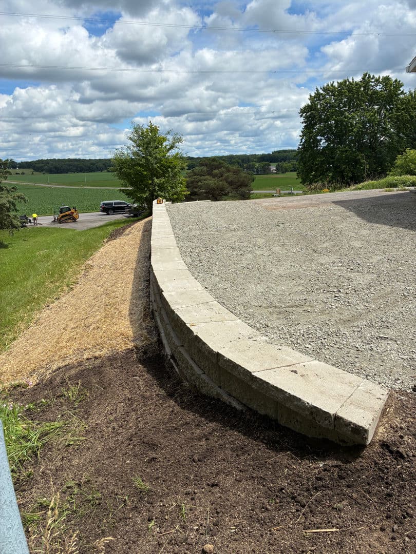 Parking Pad and Retaining Wall Built for Real Function image