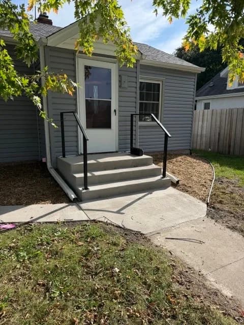 Gallery photos for New Concrete Steps and Handrails Give This Front Entry a Fresh Look: Image #1