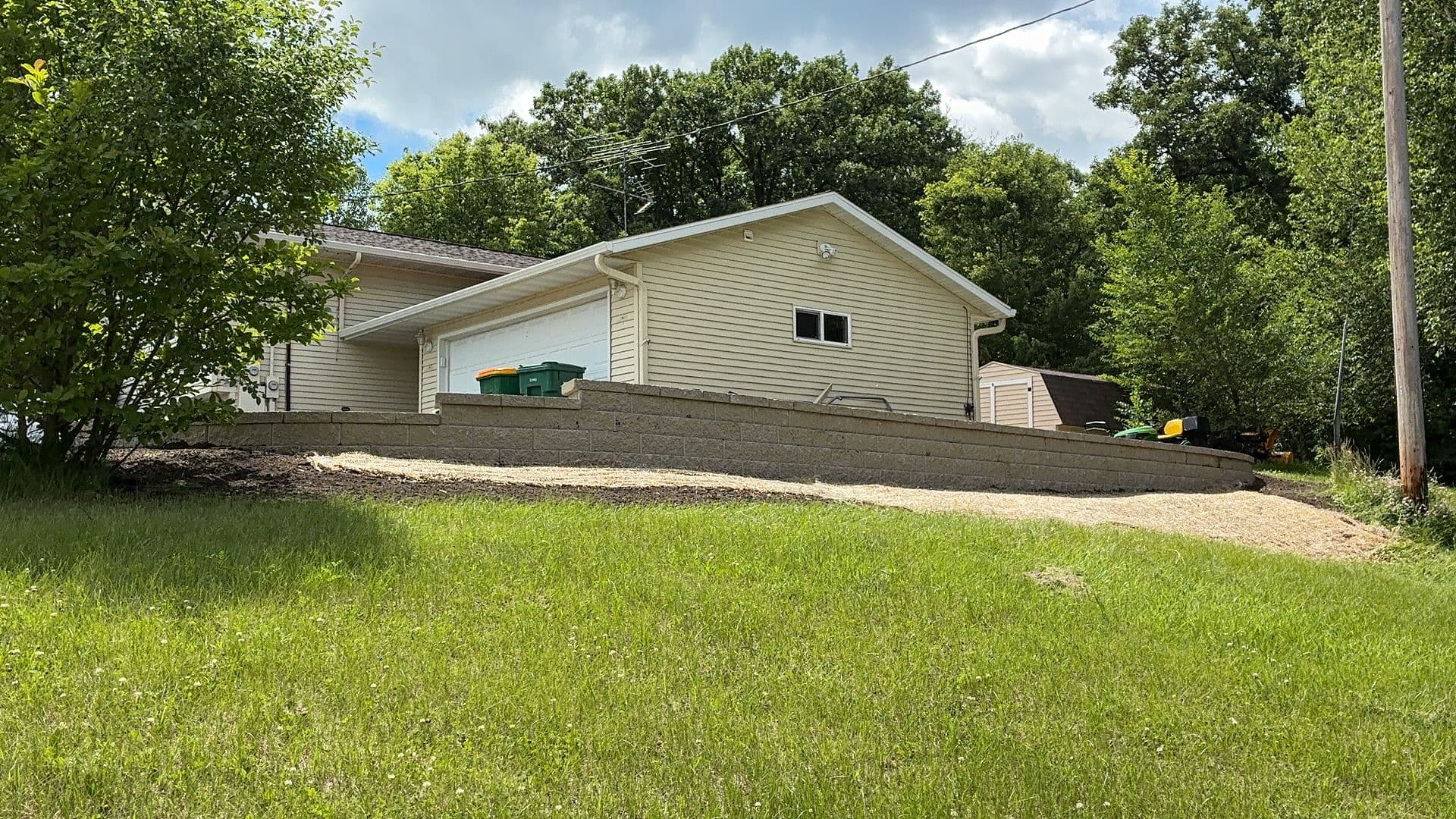 Gallery photos for Parking Pad and Retaining Wall Built for Real Function: Image #1